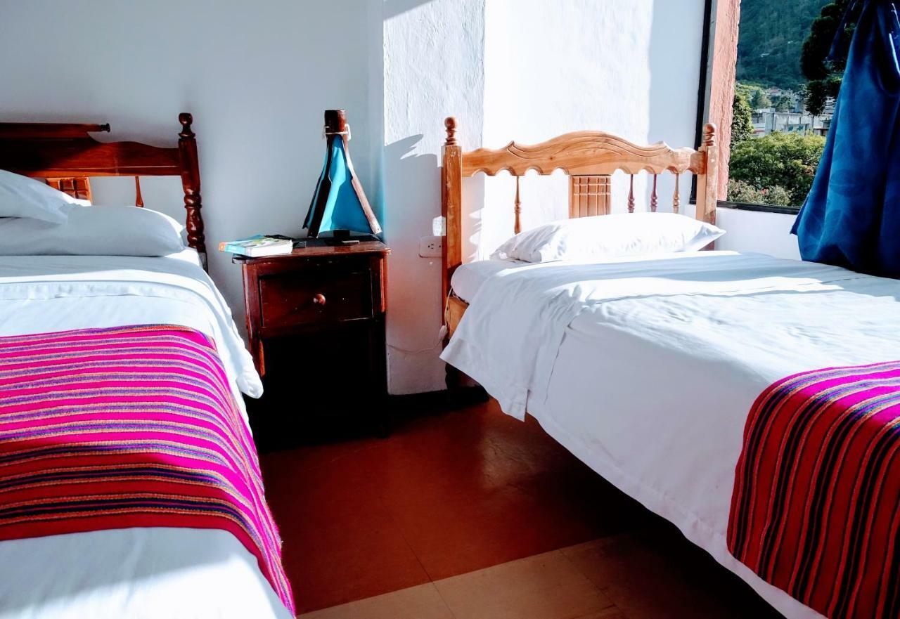 Erupcion Art Hotel & Hostel Banos  Bagian luar foto